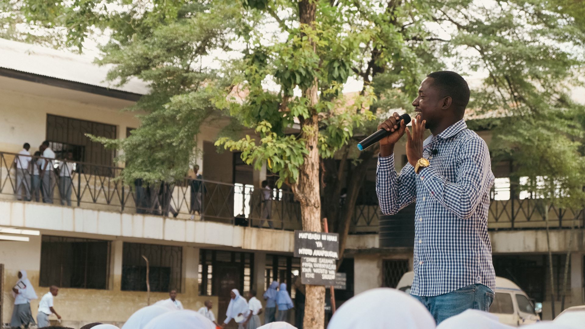 Hepatitis B Advocate Shaibu Issa speaks to students, Tanzania